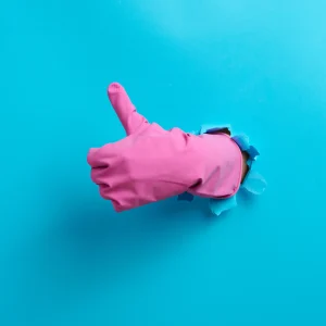 thumbs-up-with-pink-glove-breaking-through-paper-2026-01-09-06-54-29-utc